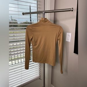 Urban outfitters tan backless turtleneck top
